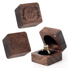 two wooden boxes with an engagement ring inside one box and the other in another case