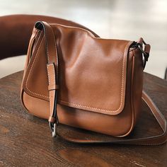 Full Grain Leather Shoulder Bag Women Crossbody Bag Leather Purse Gift for Her T21020 Model Number: T21020 Dimensions: 10.6"L x 3.1"W x 8.7"H / 27 cm(L) x 8 cm(W) x 22 cm(H) Weight: 1.5 lb / 0.7 kg Hardware: Selected Brass Hardware Shoulder Strap: Adjustable Color: Brown / Coffee / Black Features: 1. Genuine Natural Leather2. Inside 1 Mian Pocket, 2 Zipper Pockets3. YKK Zipper4. Adjustable Shoulder Strap5. Can fit Mobile Phone, Wallet. Books, etc. Leather Crossbody Bag For Women, Satchels Handbags, Leather Book Bag, Natural Leather Bag, Leather Weekender Bag, Leather Weekender, Brown Leather Crossbody Bag, Fun Clothes, Brown Crossbody Bag