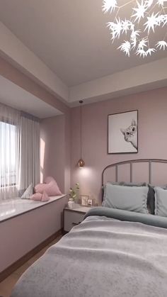 a bedroom with pink walls and grey bedding in front of a window that has white curtains