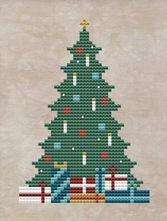 a cross - stitch christmas tree with presents on the bottom, and an ornament in the middle