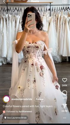 a woman taking a selfie in her wedding dress