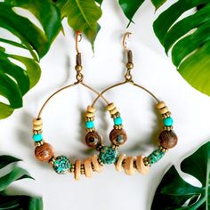 Large Circle Hoop Beaded Boho Dangling Earrings. Made Of Hypoallergenic Alloy Metal! Oil Rubbed, Tarnished Gold Bronze Finish. Gives It That Vintage Natural Vibe I Love So Much! Natural Beads Made Of Wood And Plastic Help To Keep This Earring’s Weight Comfortable Lightweight Mid-Weight The Beads’ Designs Are Comprised Of Beautiful, Oh So Boho: Wood Grain, Distressed Aqua, Faux Tarnished Stone, And Distressed/Tarnished Gold-Tone Beads The Hoop Is About 1.5 Inches X 1.5 Inches. They Aren’t Overwhe Brown Beaded Jewelry For Vacation, Bohemian Brown Hoop Earrings, Brown Bohemian Hoop Earrings, Earthy Blue Jewelry For Festivals, Bohemian Small Hoop Earrings For Vacation, Bohemian Brown Jewelry For Vacation, Bohemian Wooden Beads Hoop Earrings Gift, Bohemian Hoop Earrings With Wooden Beads For Gift, Handmade Brown Hoop Earrings For Summer