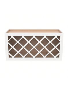 a white and brown shelf with lattice design