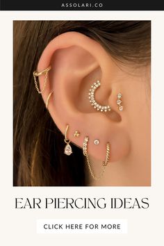 a woman's ear with three different types of piercings