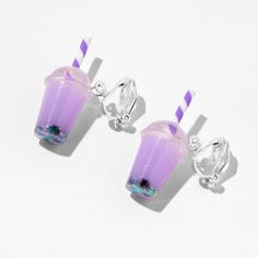 Your love for bubble tea can be expressed by these clip-on earrings. The silver-tone cuties have a purple beverage with multi-colored bobas and a coordinating straw to complete the look. Finish: Silver-tone Drop: 0.5" Closure: Clip on Material: Plastic - Claire's Purple 0.5" Bubble Tea Clip On Drop Earrings Purple Clip On Earrings, Amity Blight Earrings, Claires Earrings Claire's, Clip On Earrings For Kids, Purple Bubble Tea, Claires Earrings, Claire's Accessories, Piercing Kit, Mattel Shop