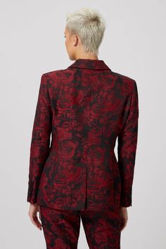 Get party season ready in the Ersilia, this winner is styled with satin peak lapels & satin contrast jets on the pockets, making it the talking point at your next event. The deep red, floral jacquard print and gold branded lining illustrates the luxury feel of this suit. Paired best with the Ersilia trousers & a dancefloor.