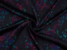 an image of a purple and blue floral print fabric