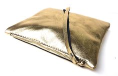 Leather pouch gold, gold leather purse, small leather bag gold Whether as cosmetic purse , pencil case or cell phone pocket ... Here stuff fits into and is well protected . Dimensions approx 16x20cm Gold Rectangular Shoulder Bag For Daily Use, Gold Leather Shoulder Bag With Cell Phone Pocket, Gold Travel Bag With Zipper Pouch, Gold Evening Shoulder Bag With Mobile Phone Pocket, Gold Rectangular Mobile Phone Shoulder Bag, Gold Evening Shoulder Bag For Mobile Phone, Gold Pouch Shoulder Bag With Cell Phone Pocket, Gold Leather Pouch Clutch, Gold Rectangular Bag With Zipper Pouch