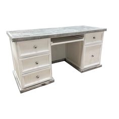 a white desk with marble top and drawers