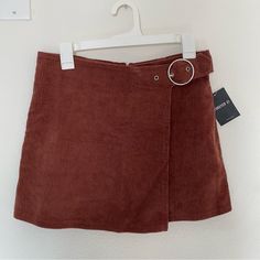 Nwt Forever 21 Rust Colored Corduroy Skirt With Buckle Detail Zipper Closure On Back If You Have Any Pet Allergies, Please Note That I Do Own A Cat Trendy Corduroy Mini Skirt, Corduroy Mini Skort For Fall, Trendy Corduroy Skirt, Fall Mini Corduroy Skort, Trendy Mini Length Corduroy Bottoms, Spring Mini Corduroy Skort, Trendy Spring Corduroy Skirt, Trendy Corduroy Skirt For Spring, Trendy Orange Skirt For Fall