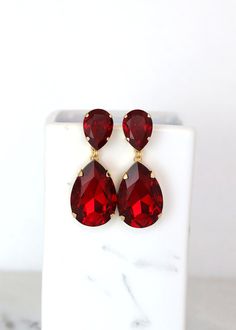 Red Statement Long Earrings, Crimson Red Chandelier Earrings, Red Ruby Crystal Earrings, Red Crystal Oversize Drop Chandelier Earrings. Superior Quality European Crystals The Crystal teardrop is prong set and rests in a border of crystals, dangling from an inverted crystal teardrop post. 1.92" in length, 0.79" across a Red Ruby Earrings, Climbing Earrings, Red Chandelier, Drop Chandelier, Crystal Fashion, Ruby Crystal, Crimson Red, Heart Drop Earrings, Ruby Earrings