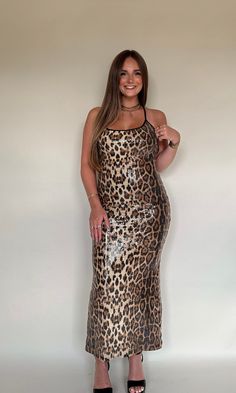 HEADS. WILL. TURN. to see you in our new Philly Dress! The perfect touch of subtle sparkle overtop a GORG cheetah maxi! Perfect way to step out for date night, formal, or anytime you're in the mood to slay! Sparkled cheetah maxi dress with black crossover straps. Model is 5'6" with a 32DD bust, 27" waist, 36" hips, and wearing a medium. Model usually wears size 4. This item runs true to size. Vintage Accessories Jewelry, Platform Heels Boots, Sandal Platform, Custom Sweatshirts, Custom Tees, Going Out Dresses, In The Mood, The Mood, Leather Top