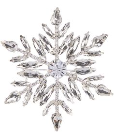 a crystal snowflake ornament on a white background