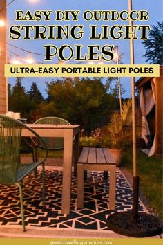 an outdoor string light pole that is attached to the side of a house with patio furniture