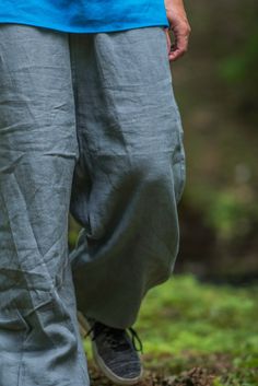 Gray linen pants for man or woman. Unisex Men and Women Can Wear. Cozy and comfortable linen trousers. Perfect for yoga, meditation or traveling. Unique baggy fit. Flax harem pants. Two ventilate pockets in front, one back pocket, secret pocket. Colors examples are in the last photos. Softened high quality Flax linen 100%. Made in EU. If you need trousers without Logo - just leave a message near the order! Other available linen colors: https://www.etsy.com/shop/PeuShop?ref=seller-platform-mcnav§ Relaxed Fit Linen Yoga Pants, Pants For Man, Mens Linen Pants, Festival Pants, Secret Pocket, Pants Baggy, Trousers For Women, Baggy Trousers, Summer Pants