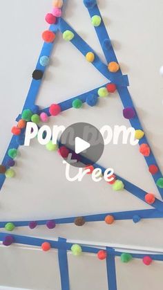 a video demonstrating how to make a pom - pom christmas tree with pops