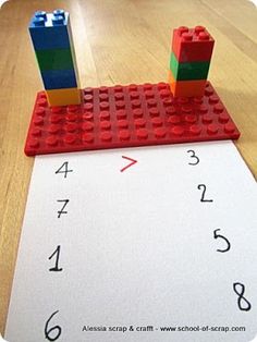 a lego table with numbers and blocks on it