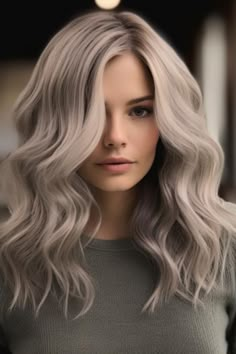 Smoky ash blonde on wavy hair is ideal for adding a mysterious allure to your look. The smoky tone gives a unique twist to the traditional ash blonde, offering a sense of depth and sophistication. Click here to check out more trending ash blonde hair color ideas you need to try. Winter Hair 2024, Ash Blonde Hair Color Ideas, Global Hair Color, Ash Blonde Hair Color, Ashy Blonde Hair, Fall Blonde Hair Color, Fall Blonde Hair, Ash Blonde Hair Colour, Blonde Shades