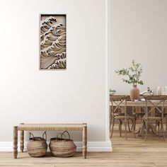 a room with a table and some baskets on the floor