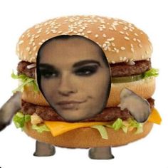 a woman's face has been cut out to look like a hamburger