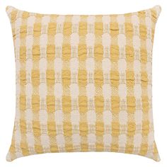 a yellow and white checkered pillow on a white background