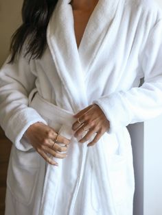 Elevate your post-bath experience with our Luxe Bath Robe, the epitome of comfort and sophistication. Crafted from a luxurious blend of cotton and bamboo viscose using cutting-edge Zero Twist technology, this robe envelops you in unmatched softness and indulgence. With an adjustable tie waist and spacious front-facing pockets, our lightweight robe offers functionality and style, making it the perfect addition to your daily routine. White Bath Robe Aesthetic, Bath Robe Aesthetic, Campground Resort, White Bathrobe, College Essentials, 2024 Christmas, Mattress Pads, Design Clothes, Bed Pillows Decorative