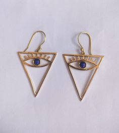 "Dainty Gold Blue Lapis Lazuli & Labradorite Evil Eye with Eyelash Huggie Earrings, Brass Charm, Eye Charm, Gifts for Her, Triangle Earrings Handmade Earrings Material:- Brass IMPORTANT NOTE....👇 1 product free gift on purchase of 3 products. You can choose the plain brass ring free gift as your wish. Take a screenshot of plain brass ring you like from my shop and send me a photo in personal message. MUST READ....👇 5 stars is my shop's priority. So contact me before leaving any negative review Symbolic Drop Earrings, Symbolic Teardrop Earrings, Triangle Metal Earrings For Gift, Triangle Earrings As Gift, Triangle Pierced Earrings As Gift, Triangle Pierced Earrings Gift, Symbolic Metal Drop Earrings, Triangle Ear Wire Jewelry For Gifts, Symbolic Metal Dangle Earrings