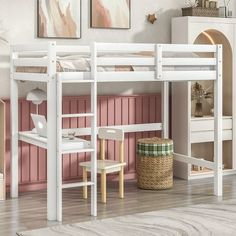 a white bunk bed sitting next to a desk and chair in a room with pink walls