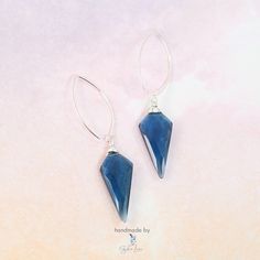 Indulge yourself or a loved one with these diamond cut kite shape blue quartz dangle drop earrings. Each gemstone is expertly crafted to reflect light, adding a touch of elegance to any outfit. These unique earrings are a must-have for any fine jewelry collection and make the perfect gift that will be cherished for years to come. Elevate your style with the stunning beauty of these blue quartz earrings. Materials: blue quartz, 925 sterling silverDimensions: 2.30 x 0.49 in Jewelry Care: See more Quartz Gemstones, Unique Diamonds, Blue Quartz, Fine Jewelry Collection, Quartz Earrings, Diamond Drop Earrings, Unique Earrings, Diamond Cut, Jewelry Care