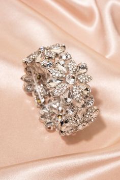 A sparkling pick me up to add to your accessories closet! This floral Austrian crystal bracelet will brighten any day. Large statement fashion jewelry that goes well with any style dresses or clothing. The perfect fashion accessory to wear to any weddings or special parties. Size Circumference: 7 in. (17.78 cm) Height: 1.39 in (3.53 cm) Quality These well designed bracelet use an eco-friendly, lightweight, strong black color metal alloy, with top quality brilliant black glass crystal stone and s Accessories Closet, Statement Fashion, Pearl Shop, Holiday Essentials, Pearl Set, Crystal Stone, Style Dresses, Crystal Bracelet, Glass Crystal