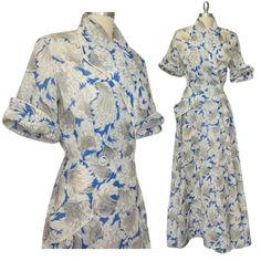 Stunning vintage 1940's to early 50's feather print wrap shirt dress in semi sheer silky taffeta like material. Two front covered button closure, interior tie waist. Piping at collar at cuffs and jaunty pocket. Nice vintage condition. There are a few marks as shown in photos and some stress to the seam at two noted areas on the waist. Excellent flow and drape! Dress form is a modern size 4 and this fits it perfectly, see measurements below for best fit. No size or material tag, potentially hand made. Measurements are approximate, lying flat.  19" Bust pit to pit 13.5" Across the waist 56.5" Length shoulder to hem 40's, 1940s, Old Hollywood, Glamour, day dress, wrap dress 1940s Old Hollywood, A Streetcar Named Desire, Wrap Shirt Dress, Drape Dress, White Feather, Wrap Shirt, Dress Wrap, White Feathers, Feather Print