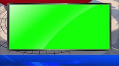 a green screen tv sitting on top of a table