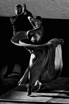 black and white photograph of two people dancing