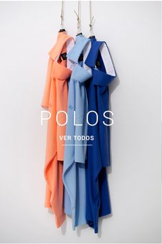 several scarves hanging from hooks with the words polos over them