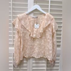 Blush/Peach Colored Blouse Chic Apricot Long Sleeve Tops, Apricot Long Sleeve Top For Summer, Chic Long Sleeve Apricot Top, Long Sleeve Apricot Top For Summer, Elegant Pink Lace Top Blouse, Feminine Lace Top Blouse, Feminine Beige V-neck Blouse, Chic Apricot Blouse For Spring, Apricot Long Sleeve Blouse For Spring