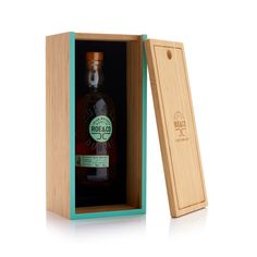 a bottle of whisky in a wooden box