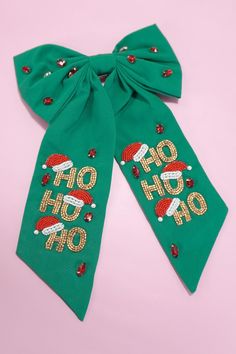 Christmas Ho Ho Ho Bow Hair Clips, a festive and fun accessory for the holiday season. These hair clips feature playful bows adorned with "Ho Ho Ho" seed bead lettering, perfect for adding a touch of Christmas cheer to your hairstyle. Ideal for holiday parties, events, or everyday wear, they combine style and festive spirit to make your look merry and bright. DIMENSIONWidth: 7"length: 11" Diy Holiday Hair Accessories, Christmas Clips Hair, Christmas Embroidery Hair Clip, Chrismas Hair Clip, Holiday Hair Bows, Beaded Hair Clips, Toddler Accessories, Holiday Hairstyles, Love Clothing