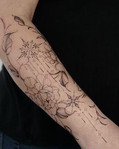 a person with a tattoo on their arm