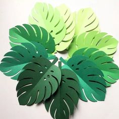 cut out paper leaves sitting on top of each other