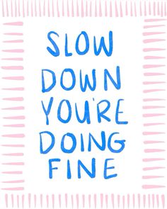 the words slow down you're doing fine are drawn in blue ink