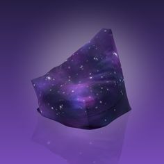 a purple and blue space themed hat with stars on it