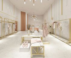 the interior of a clothing store with gold and white furniture, chandeliers and shoes