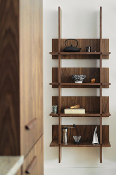 a wooden shelf with several items on it