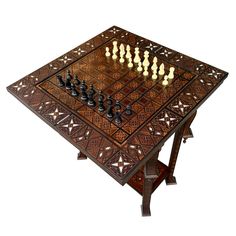 a wooden chess set on top of a table