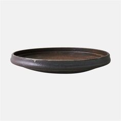 a wooden bowl with black rim on a white background, it is empty and ready to be used as a serving platter