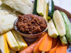 carrots, celery, cucumbers and other vegetables on a plate