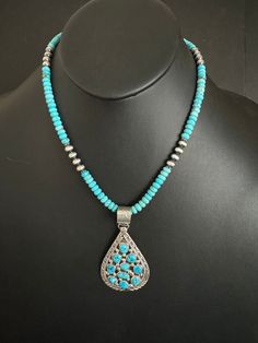 Navajo sterling silver turquoise necklace pendant The necklace measures 18 inch Pendant 2.5 inch by 1.5 inch Southwestern Style Turquoise Pendant Necklace With Oxidized Finish, Southwestern Blue Teardrop Pendant Necklace, Southwestern Silver Turquoise Teardrop Pendant Necklace, Southwestern Turquoise Pendant Necklace Stamped 925, Southwestern Teardrop Necklace With Large Pendant, Southwestern Teardrop Pendant Necklace, Southwestern Turquoise Necklace With Sterling Silver Clasp, Pretty Jewelry, Beaded Necklaces