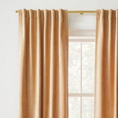 the curtains are closed in front of a window