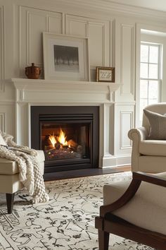 a living room filled with furniture and a fire place in the middle of the room