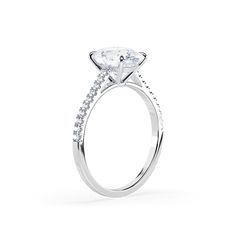 a diamond engagement ring on a white background